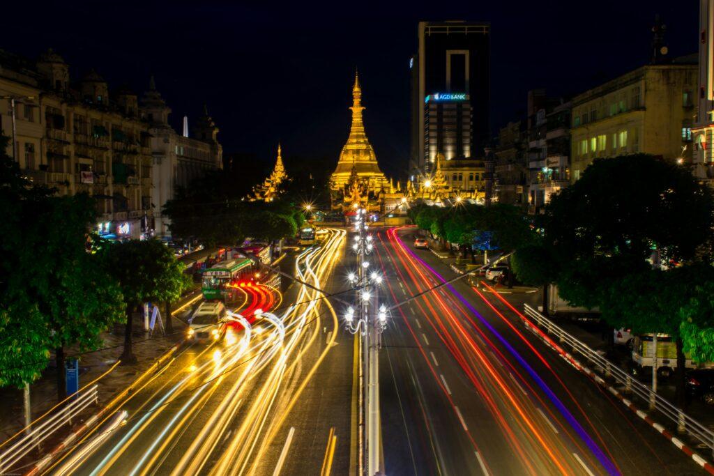 pexels-photo-5783469-5783469 A stunning night scene of traffic motion around the illuminated Sule Pagoda in Yangon, Myanmar.